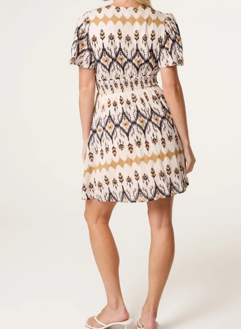 بلو فانيلا Embroidered Wrap Front Mini Dress
