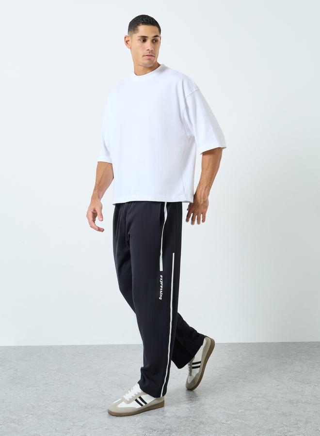 ستايلي بنطال جوغر واسع بطبعة كتابة - Image 2