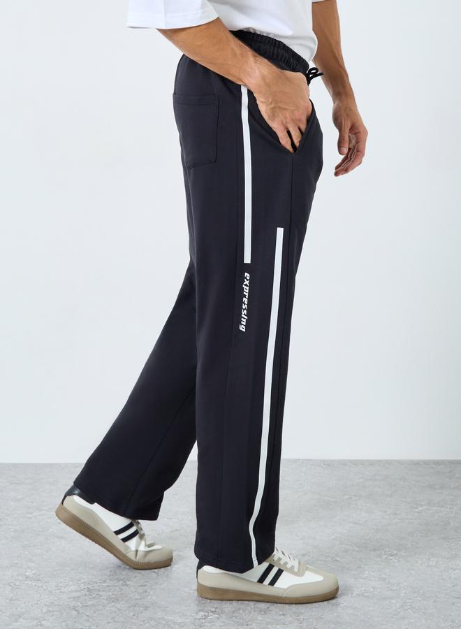 ستايلي بنطال جوغر واسع بطبعة كتابة - Image 1