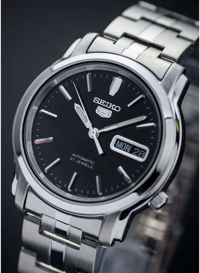Seiko ساعة يد أوتوماتيكية للرجال 5 SNKK71K1، 38 مم قرص أسود، علبة وسوار من الفولاذ المقاوم للصدأ، 30 م مقاومة للماء - Image 1