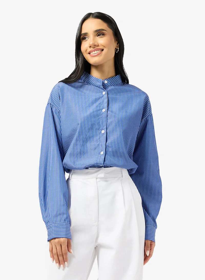 جينجر قميص بأزرار مخطط كبير الحجم