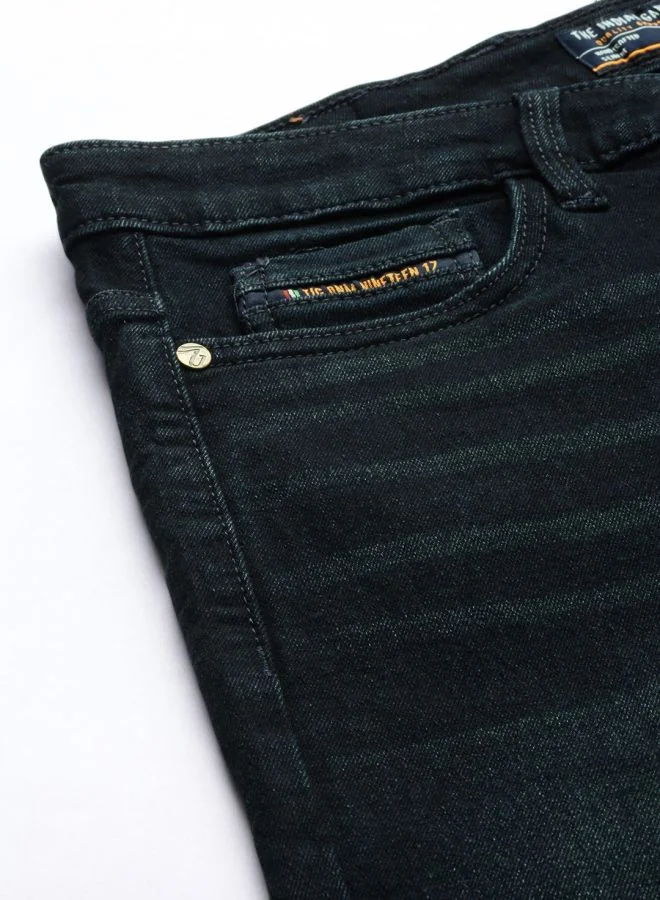 شركة المرآب الهندية Men Bootcut Solid Mid-Rise Stretchable Jeans