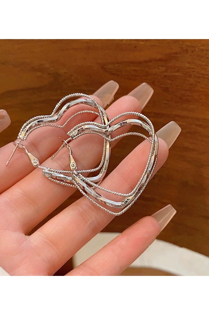 Minimalist Heart Hoop Earrings for Women – Geometric Statement Studs, European Cool Style, Bold Face-Slimming Ear Jewelry - Image 4