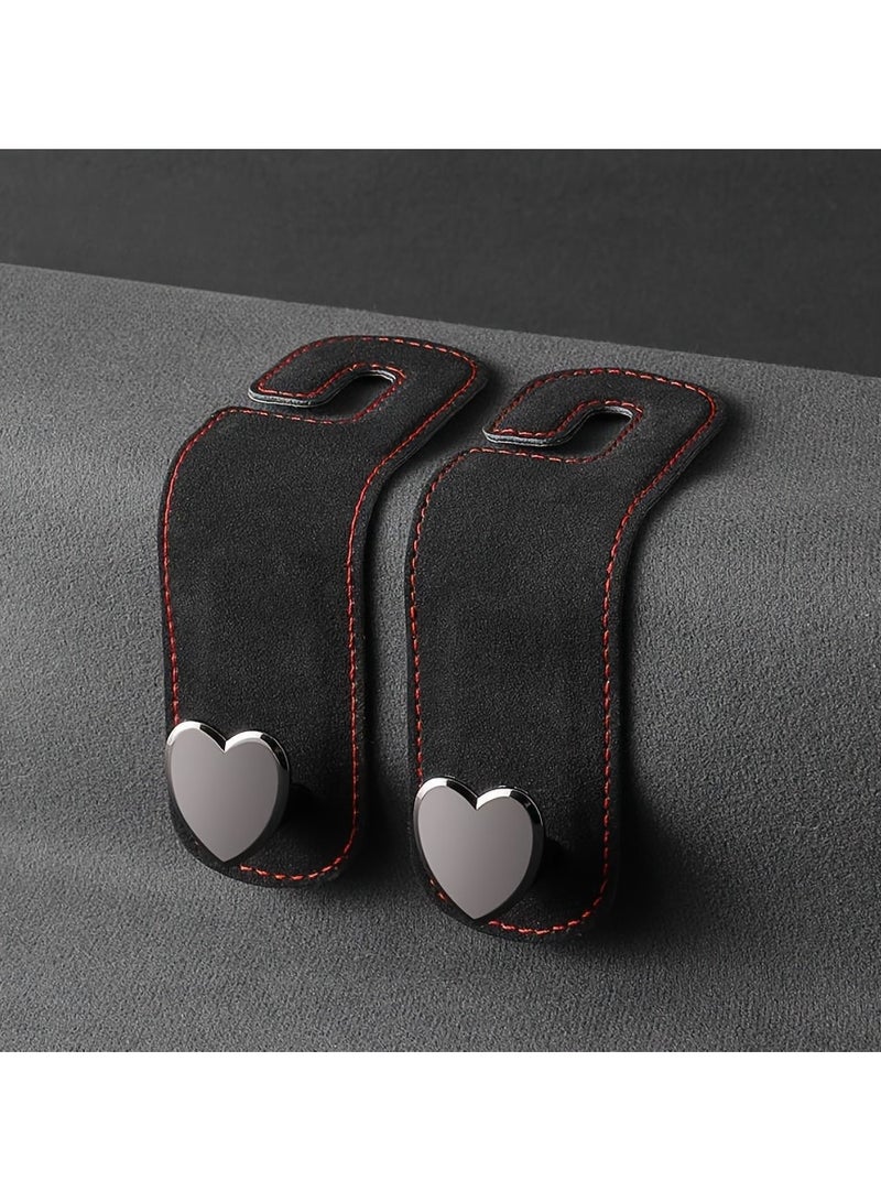 خطافان لمقعد السيارة على شكل حب - منظمان معدنيان فاخران للمقعد الخلفي لحقائب اليد والسترات والمحافظ - مشابك مضادة للانزلاق للسيارة وملحقات تخزين المركبات الترفيهية (أسود، قابل للدوران 360 درجة) - Image 1
