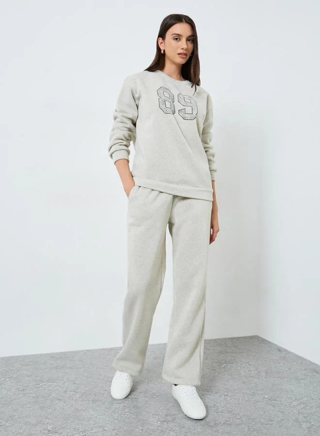 Styli Styli Printed Crew Neck Sweatshirt and Joggers Co-Ords