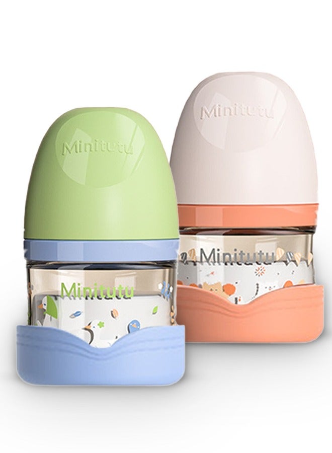 Minitutu Pack of 2 Anti-Colic Glass Feeding Bottle for Newborn with Breast-Like Nipples and Silicone Anti Drop base, 80ml, 0M+, Wide-Neck(Pink&Green) - Image 1