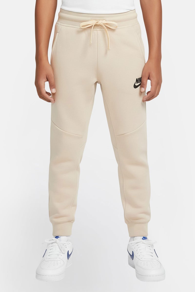 Nike سروال جوجر خارجي للأطفال الأولاد بحبل سحب، رمادي فاتح - Image 1