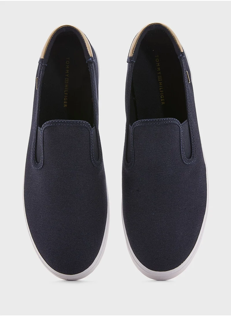 TOMMY HILFIGER VULCANISED CANVAS SLIP ON TRAINERS