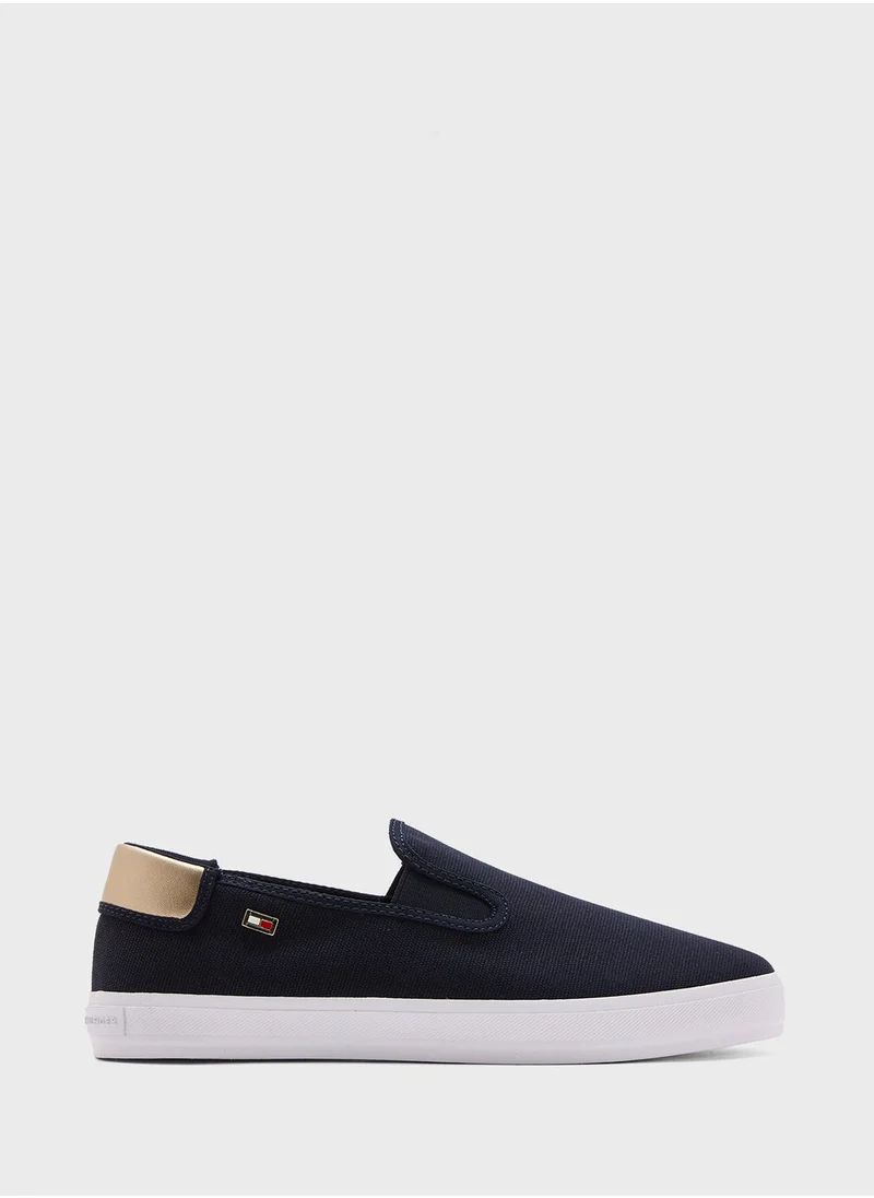 تومي هيلفيغر VULCANISED CANVAS SLIP ON TRAINERS
