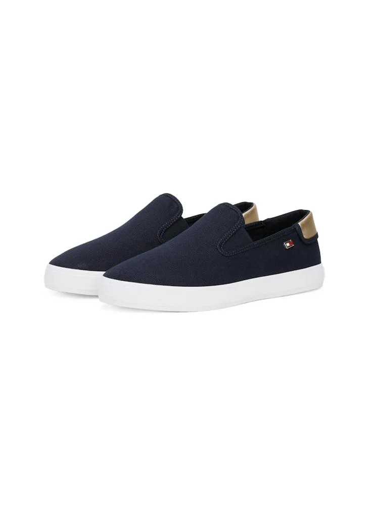 تومي هيلفيغر VULCANISED CANVAS SLIP ON TRAINERS