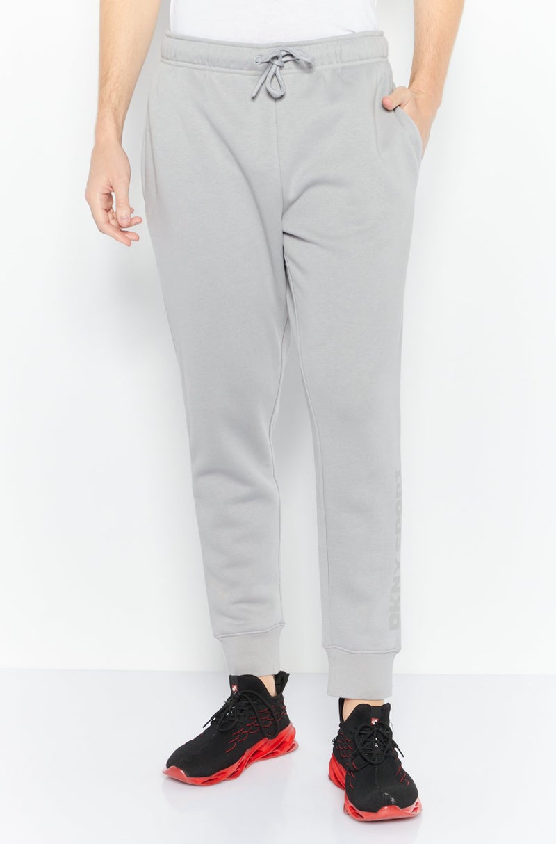 DKNY Sport سروال رياضي للرجال مع حبل سحب، فضي - Image 1