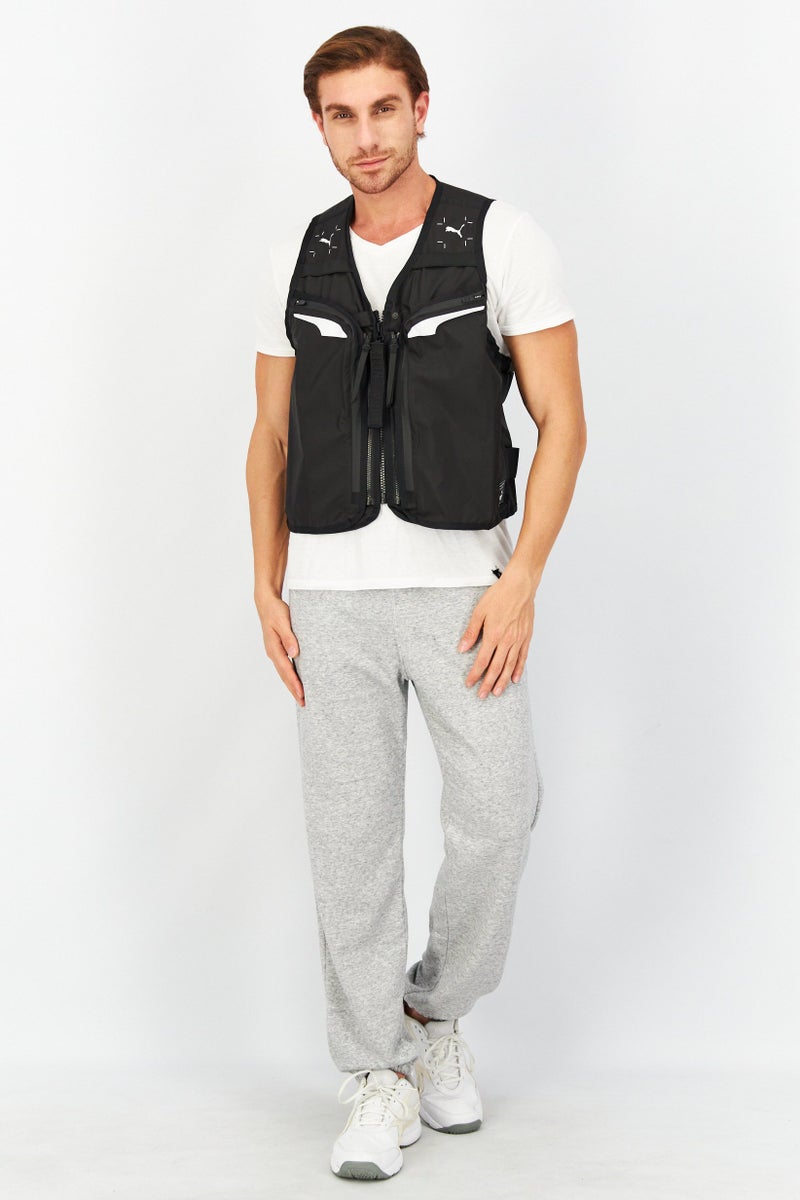 PUMA سترة رياضية للرجال بدون أكمام، سوداء - Image 4