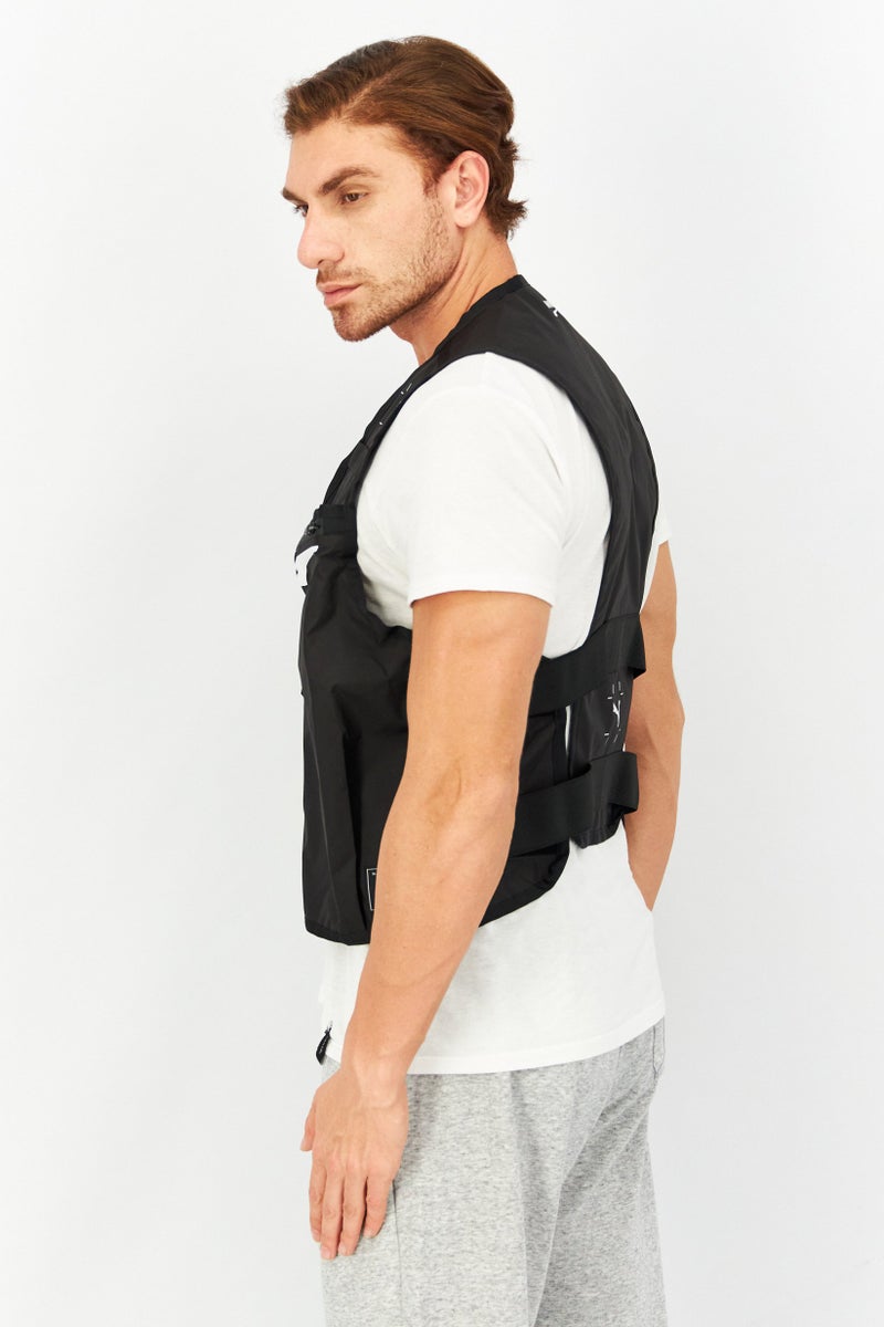 PUMA سترة رياضية للرجال بدون أكمام، سوداء - Image 2