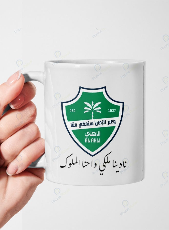 A ceramic mug printed with the phrase Our club is royal and we are the kings featuring a comfortable handle