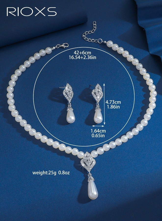 ريوكس مجموعة مجوهرات من اللؤلؤ مكونة من قطعتين للنساء، قلادات وأقراط أنيقة من اللؤلؤ والكريستال الفضي، قلادة وسوار زفاف أنيقان من اللؤلؤ الصناعي، قلادة كريستالية للعروس، إكسسوارات لعيد الحب، الزفاف، الأزياء، حفلات التخرج، الحفلات - Image 5