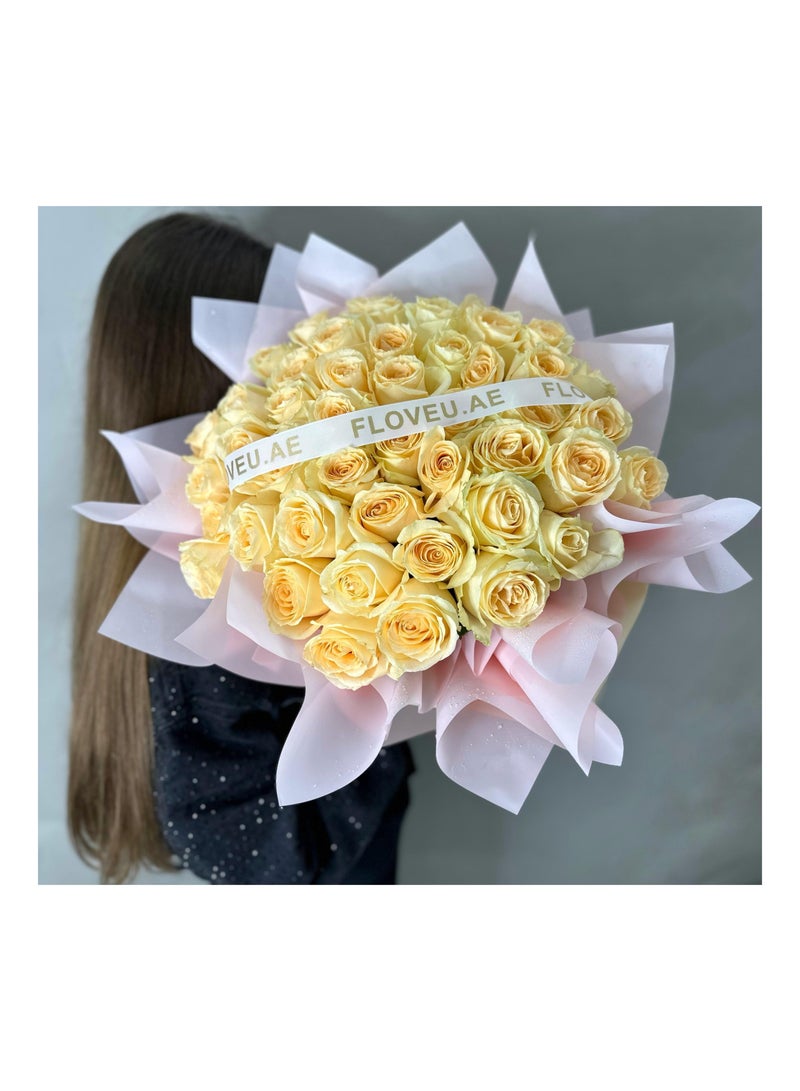 Generic Bright Yellow Roses Wrapped in Delicate Baby Pink Paper