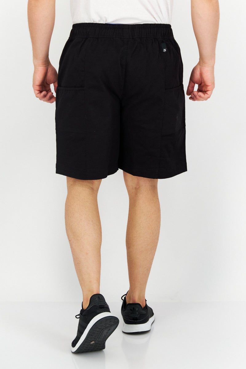 PUMA شورتات تدريب رياضية للرجال بشعار العلامة التجارية، أسود - Image 4