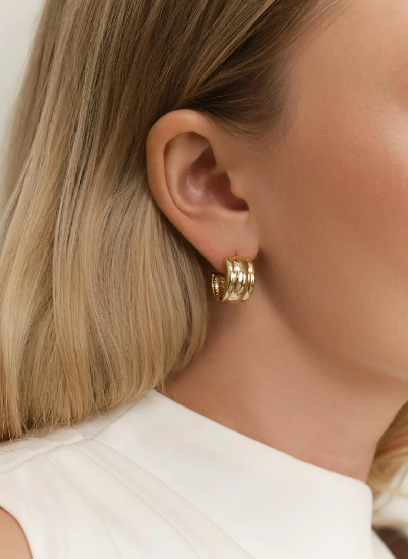 Lichi Half-hoop earrings in textured metal