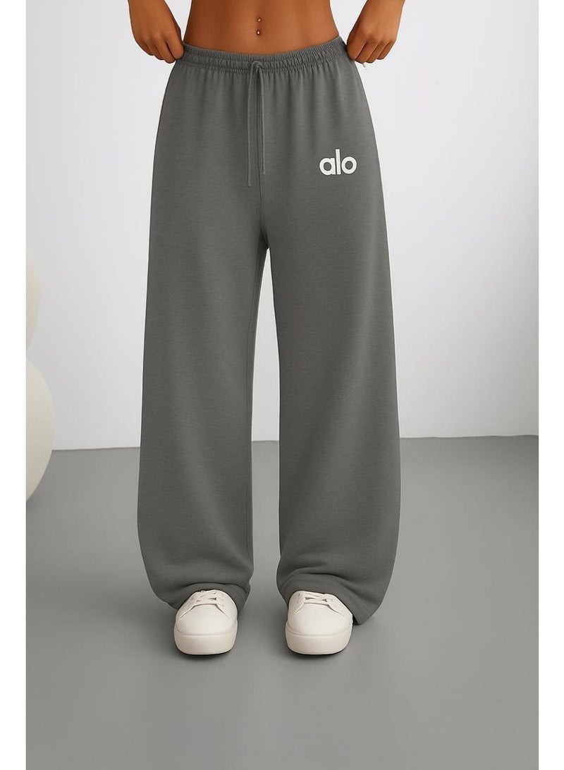 Wide-leg alo Romadi with a distinctive design, made of cotton inside, smooth texture on the outside, comfortable wide legs, with a waistband drawstring.