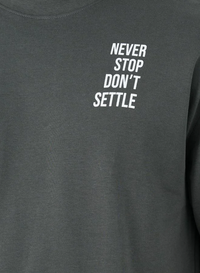 ستايلي Styli Slogan Print Oversized Round Neck T-Shirt