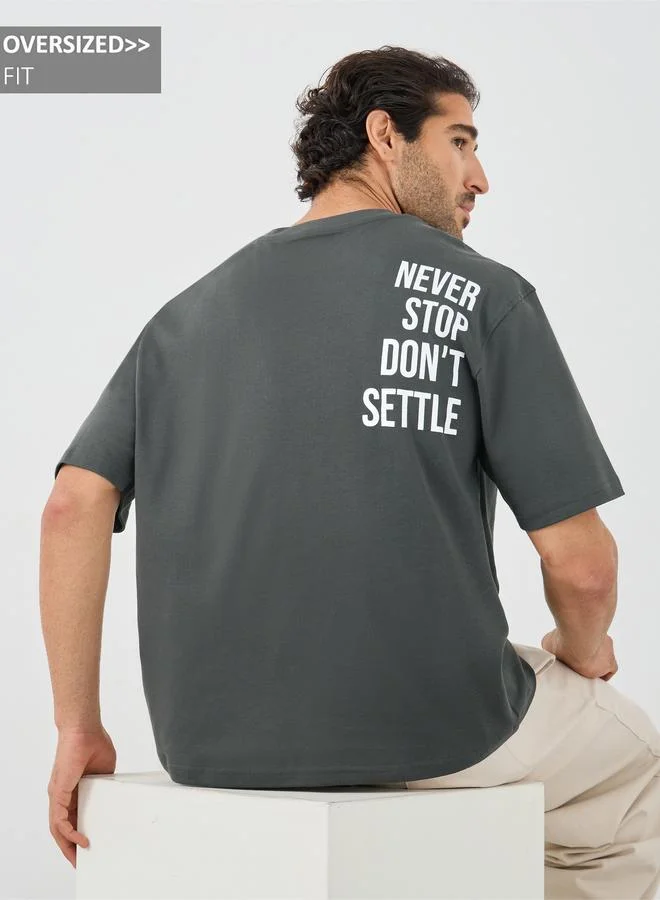 Styli Streetwear Front and Back Slogan Print Oversized Interlock T-Shirt
