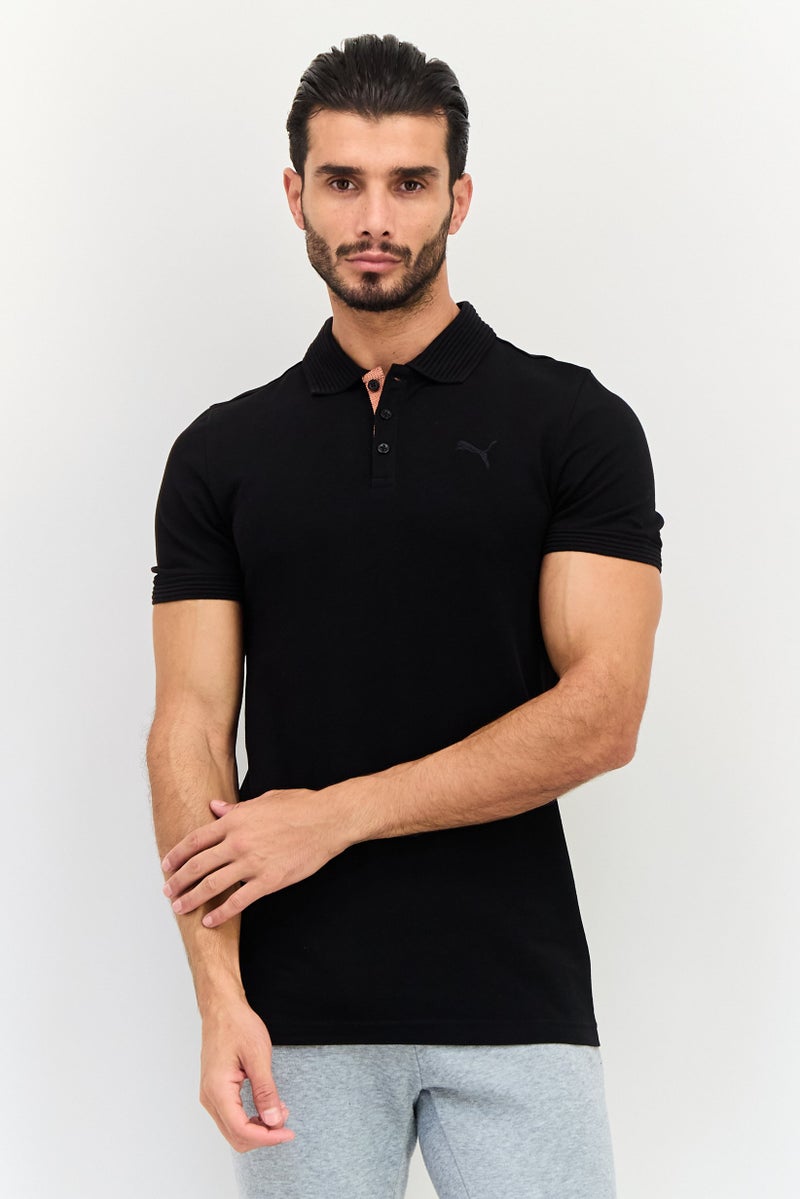 PUMA قميص بولو خارجي للرجال بقصة ضيقة بأكمام قصيرة، أسود - Image 1