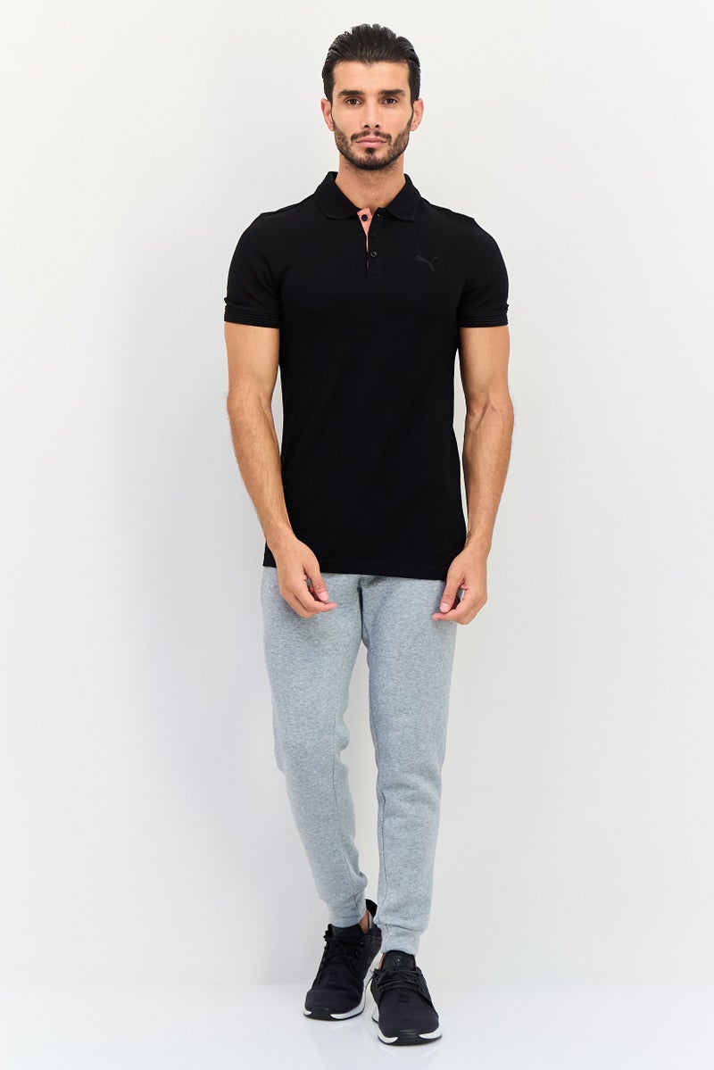 PUMA قميص بولو خارجي للرجال بقصة ضيقة بأكمام قصيرة، أسود - Image 4