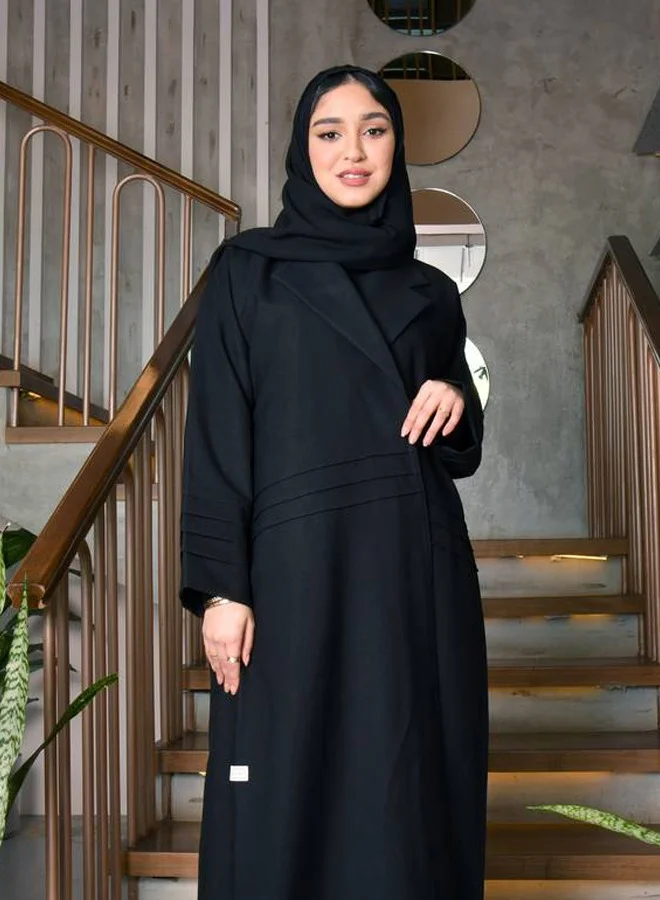 HAWRAA ABAYA Black wrap abaya with a blazer cut and a soft, striped design with simple lines