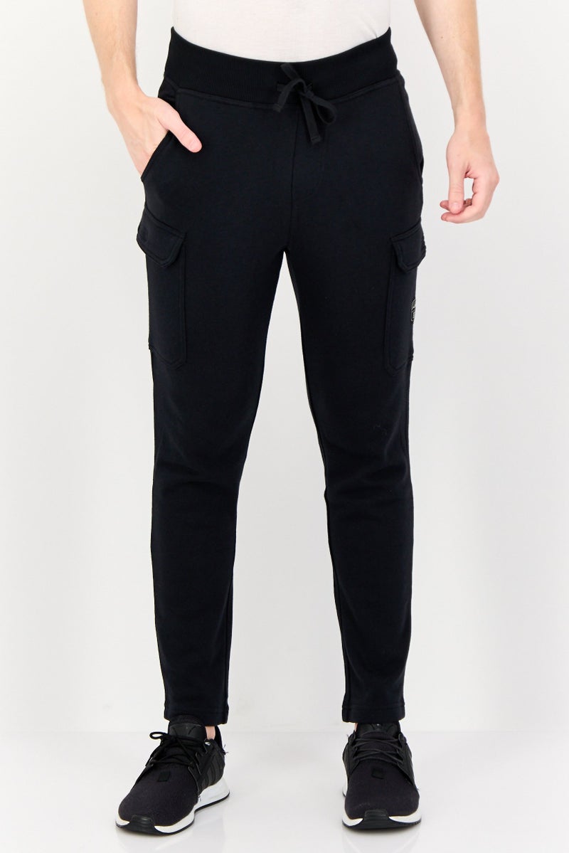 SKECHERS Men Sportswear Fit Outdoor Sweatpants, Black - Image 1