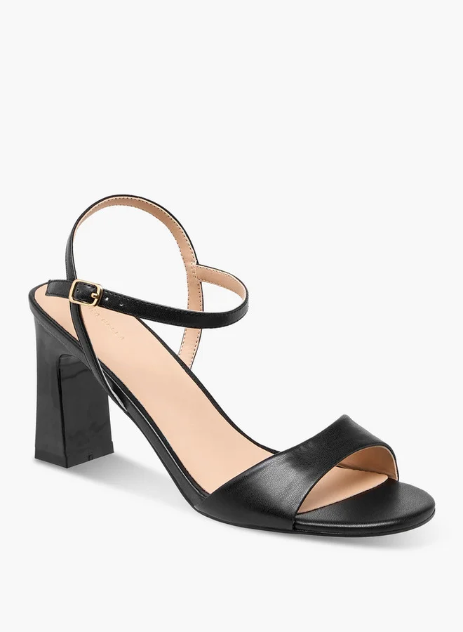 فلورا بيلا من شو إكسبرس Solid Block Heel Sandals with Buckle Closure