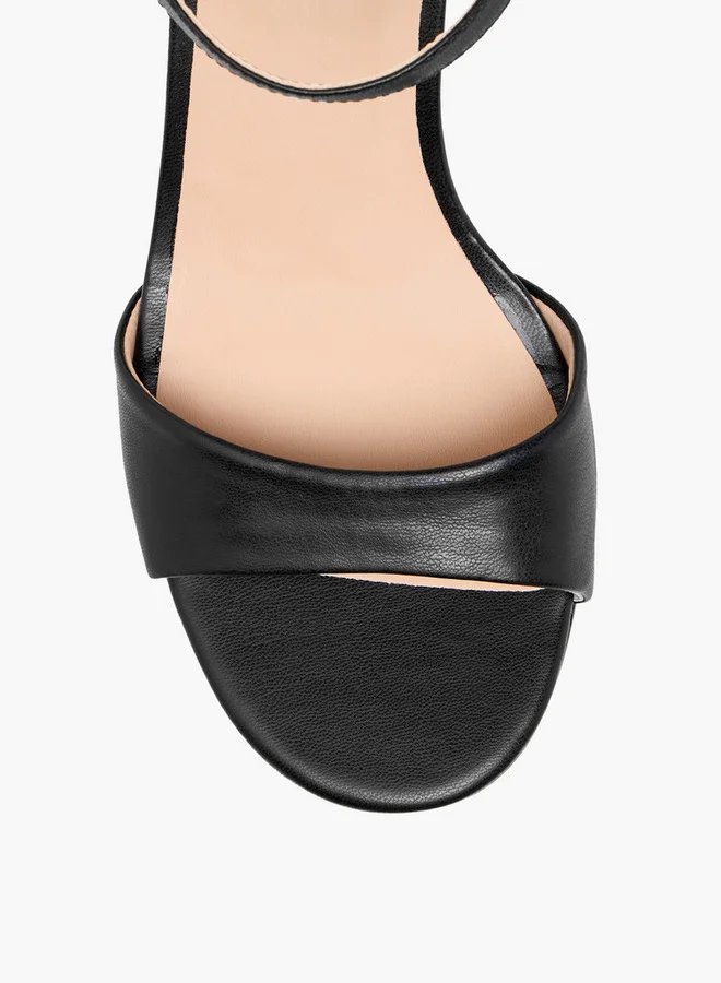 فلورا بيلا من شو إكسبرس Solid Block Heel Sandals with Buckle Closure