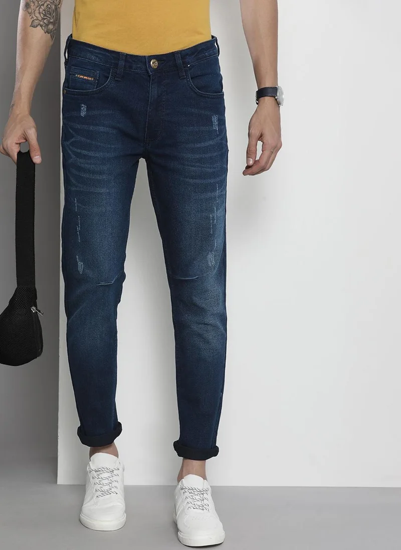 Men Carrot Fit Solid Mid-Rise Stretchable Jeans