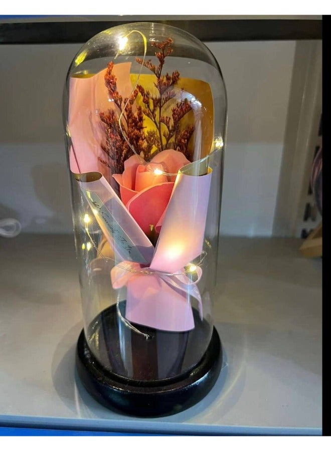 Experience timeless elegance with the Rose Inside a Glass Dome, inspired by the magical story of "Beauty and the Beast." This stunning artificial red rose symbolizes everlasting love, making it a perfect, thoughtful gift for women on any special occasion.  - Image 3
