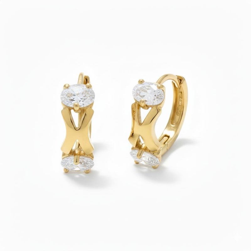 حلق ذهبي مرصع بفص زركون بيضاوي لامع في الأعلي والأسفل بتصميم X الأنيق، قطعة عصرية تمنحكِ بريقاً استثنائياً في كل مناسبة. - Image 1