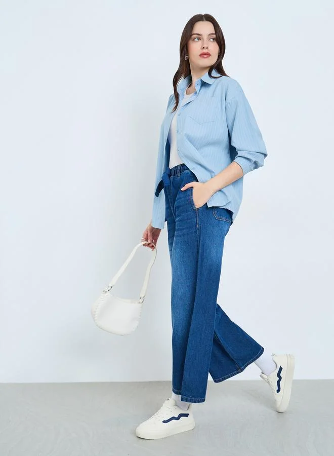 ستايلي قميص مخطط بقصة واسعة