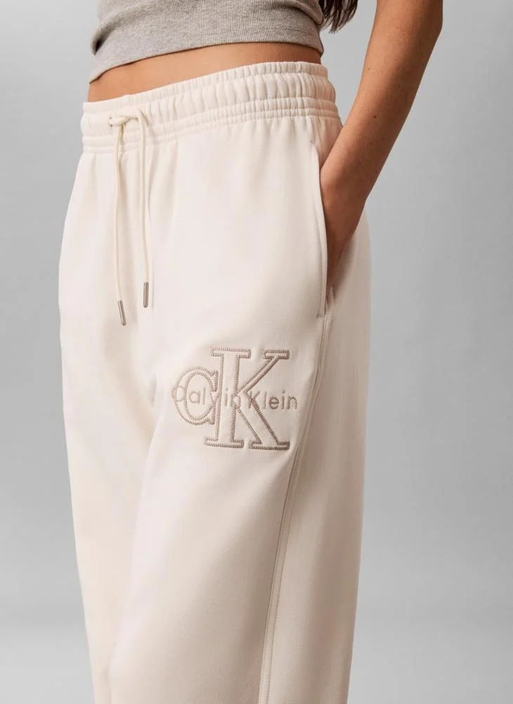 Calvin Klein Jeans Tofu Textured Monologo Embroidery Terry Joggers for Women | Best Price UAE