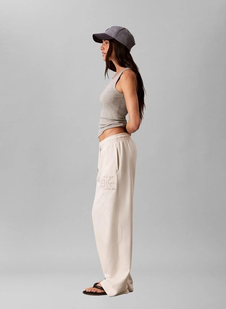 Calvin Klein Jeans Tofu Textured Monologo Embroidery Terry Joggers for Women | Best Price UAE