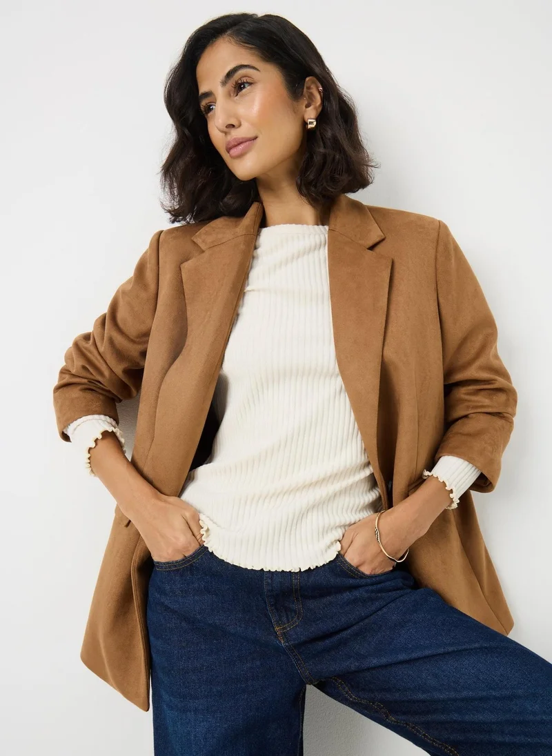 ماتلان بلوزة كريمية ناعمة مضلعة