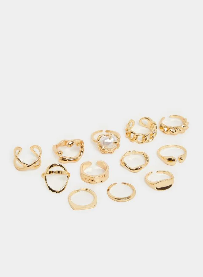 ستايلي طقم من 12 خاتم بلون ذهبي