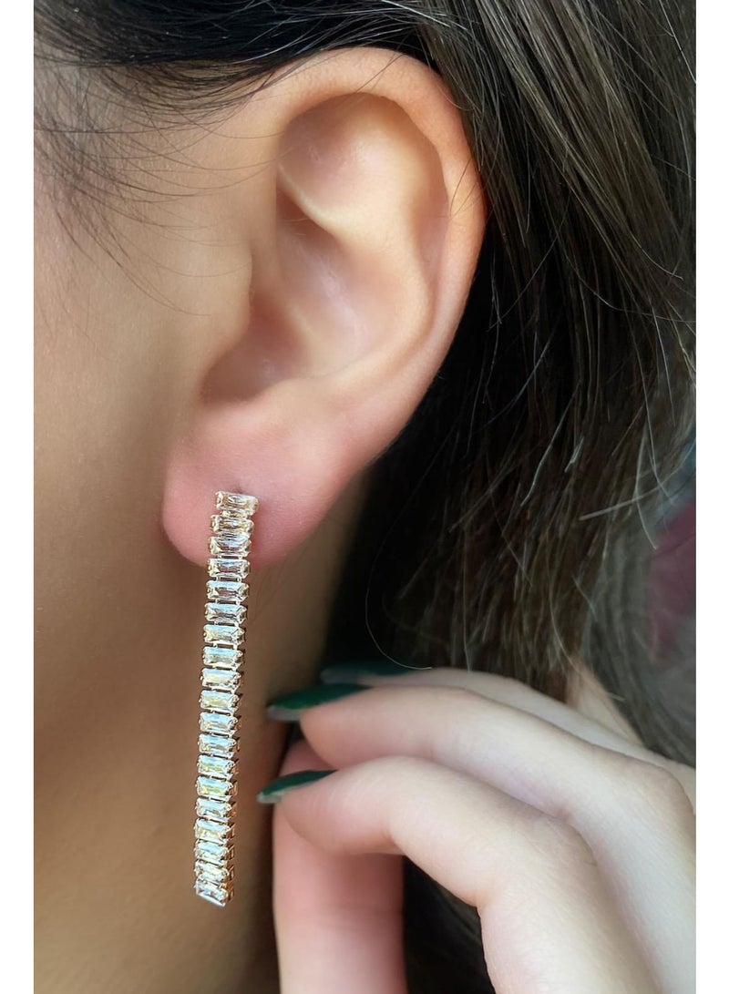 Luxuria Long baguette-style drop earrings with vertically arranged zircon stones. - Image 1