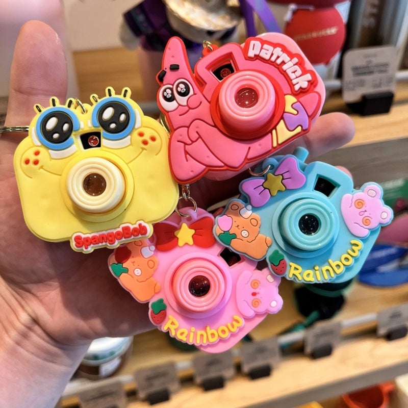 Cartoon Projector Keychain Toy: Durable Plastic Pink2 - Multifunctional Compact Charm for Kids, Cartoon Fans and Bag Accessory Lovers - Image 4