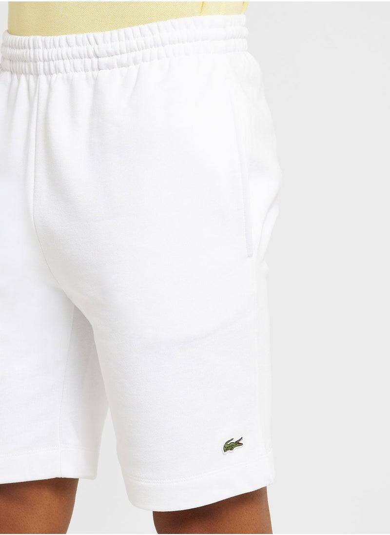 LACOSTE - Logo Pocket detailed Shorts - Image 1