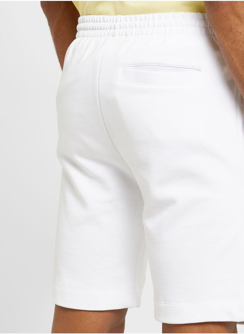 LACOSTE - Logo Pocket detailed Shorts - Image 1