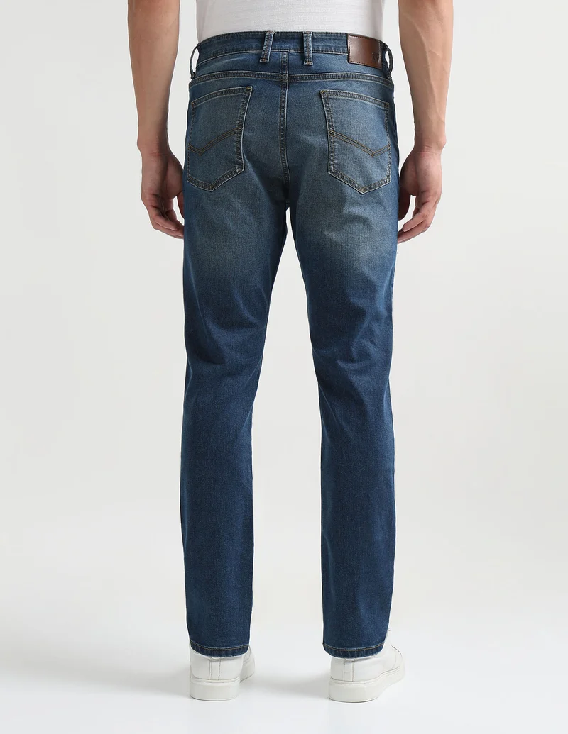 Arrow Indigo Soho Slim Tapered Fit Mid Rise Jeans for Men | Best Price UAE