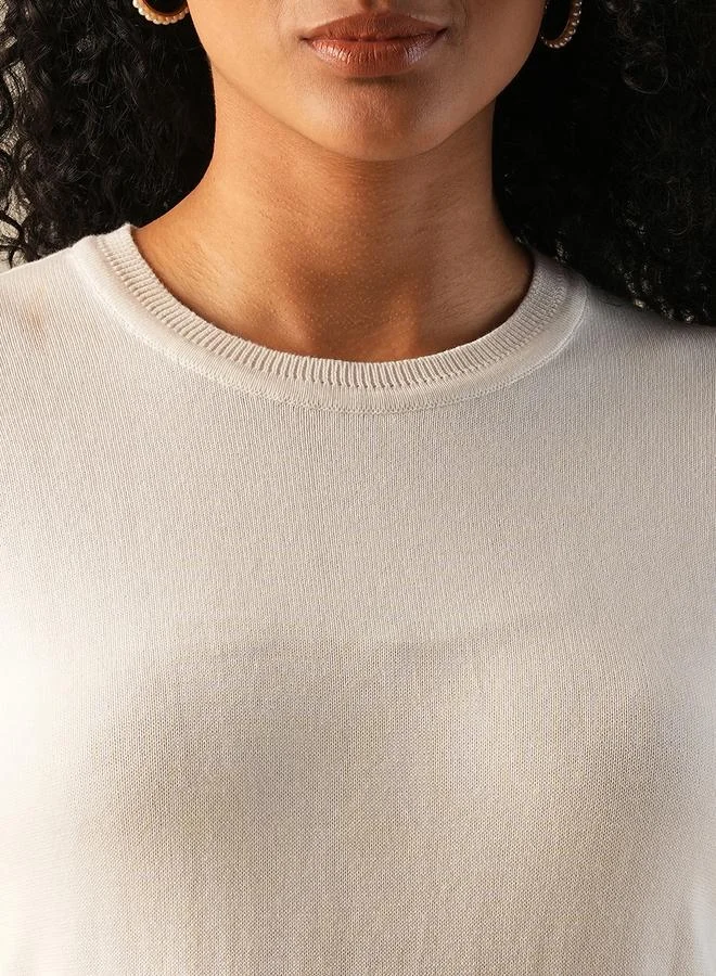 جلو باص سويتر محبوك ابيض بياقة دائرية