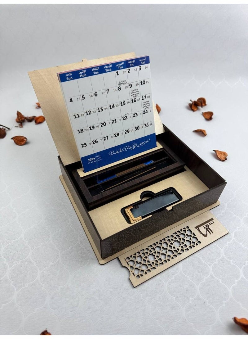 Samrix The 2026 Calendar Box: A Complete Wooden Gift Set for All Occasions. This elegant box contains: a wooden box with a paper calendar (Gregorian and Hijri) inside, a calendar stand, and incense sticks. ✔ Luxurious calendar box with an elegant wooden design ✔ Contains a paper calendar (Gregorian and Hijri) ✔ Includes a dedicated calendar stand ✔ Includes a premium incense burner ✔ Free additional incense sticks ✔ Suitable for office and home use ✔ Combines practicality and luxury ✔ An ideal gift for all occasions ✔ Suitable for corporate gifts ✔ Sophisticated design adds a touch of luxury ✔ High-quality wood materials ✔ Distinctive and long-lasting fragrance ✔ Suitable for formal gifts ✔ Elegant organization of days and appointments ✔ Ready to give immediately ✔ A practical and decorative piece ✔ An ideal choice for upscale gifts - Image 3