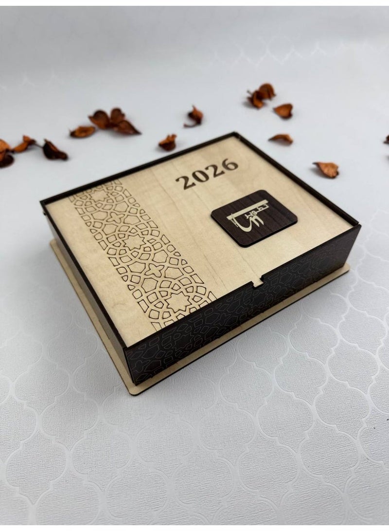 Samrix The 2026 Calendar Box: A Complete Wooden Gift Set for All Occasions. This elegant box contains: a wooden box with a paper calendar (Gregorian and Hijri) inside, a calendar stand, and incense sticks. ✔ Luxurious calendar box with an elegant wooden design ✔ Contains a paper calendar (Gregorian and Hijri) ✔ Includes a dedicated calendar stand ✔ Includes a premium incense burner ✔ Free additional incense sticks ✔ Suitable for office and home use ✔ Combines practicality and luxury ✔ An ideal gift for all occasions ✔ Suitable for corporate gifts ✔ Sophisticated design adds a touch of luxury ✔ High-quality wood materials ✔ Distinctive and long-lasting fragrance ✔ Suitable for formal gifts ✔ Elegant organization of days and appointments ✔ Ready to give immediately ✔ A practical and decorative piece ✔ An ideal choice for upscale gifts - Image 4