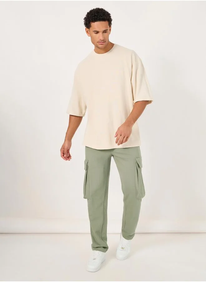 Styli Oversized Mid Rise Open Hem Jogger with Cargo Pocket