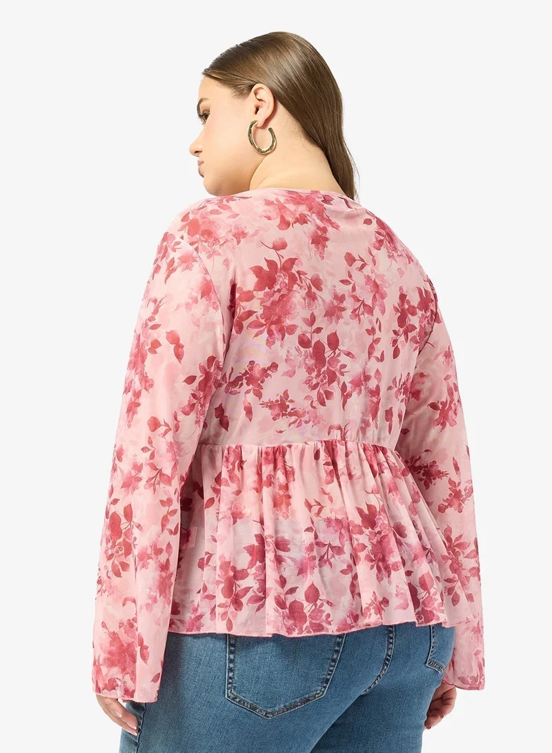 جينجر بلس بلوزة بتفاصيل زهور مجمعة