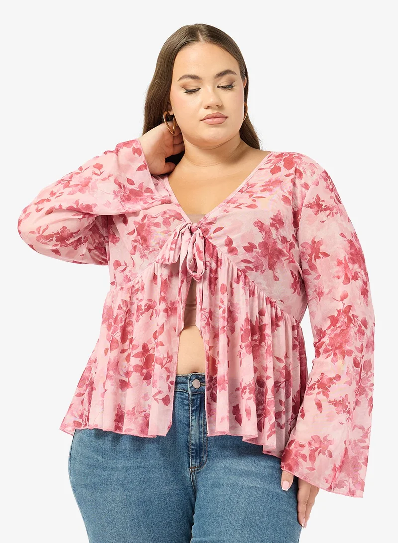 جينجر بلس بلوزة بتفاصيل زهور مجمعة